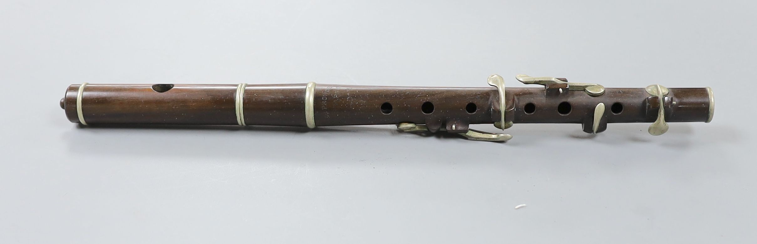 A Keith Prowse flute, 30cm, in original mahogany case